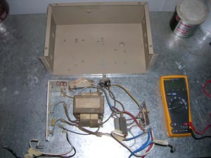 Remove the old converter from the housing